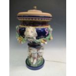 A large Minton majolica vase, moulded with garlands supported by animal heads, impressed mark,