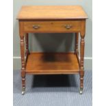 Stamped "Heal & Son London" circa 1900 a walnut two tier lamp table, the single frieze drawer over