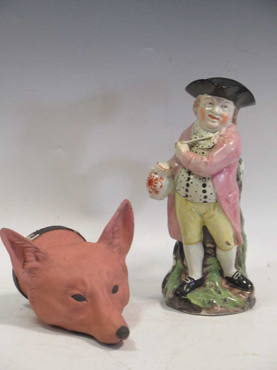 A 19th century Staffordshire Hearty Good Fellow Toby jug, 26.5cm high; a late 19th century bisque