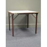 A Mudies squeezer card table with felt top and folding legs, top measures 86 x 86cm