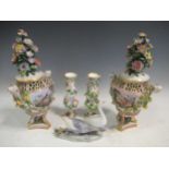 A pair of Meissen style floral encrusted vases and covers, 34cm high; a pair of floral encrusted