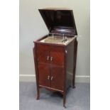 A gramophone cabinet with later electric turntable and an Edwardian cake stand (A/F)