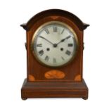 A mahogany and satinwood inlaid bracket clock, early 20th century, with arched top over 7inch