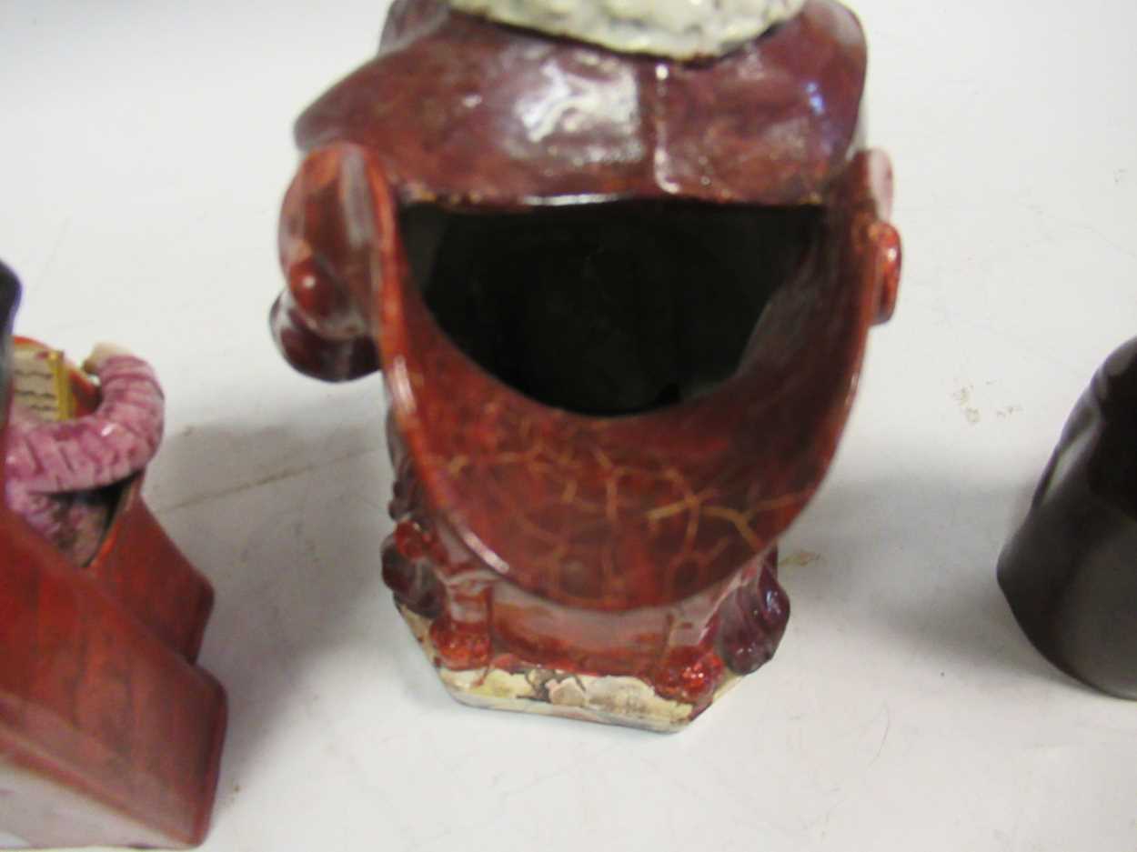 Two treacle glazed spirit flasks modelled as 'Old Tom'; a Staffordshire figure of 'The judge and the - Bild 6 aus 7