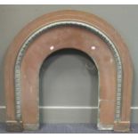 A Victorian fireplace insert, arched top, 94cm high, 97cm wide.