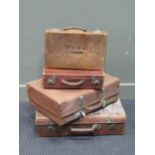 Two leather trunks and two leather briefcases (4)