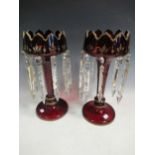 A pair of Bohemian red glass lustres, with gilt decoration, 40cm high