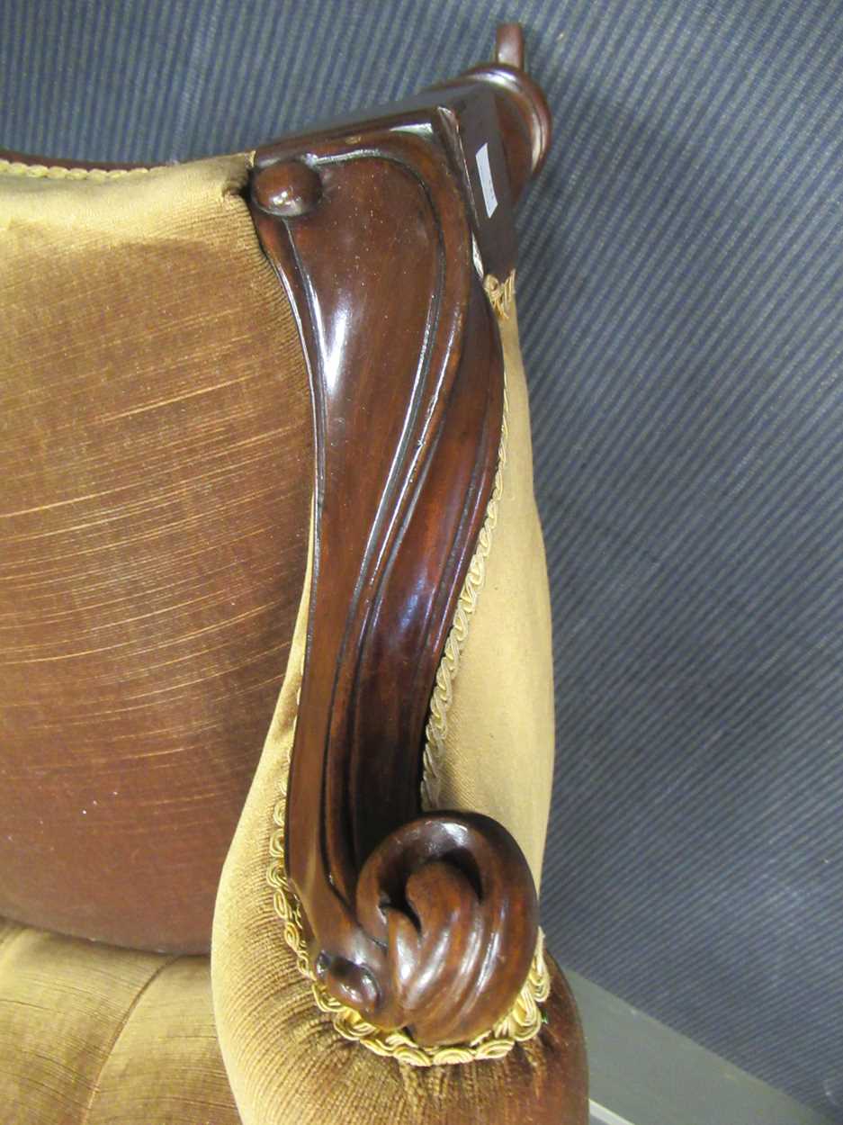 A mid-Victorian mahogany button back scroll carved armchair on turned legs and ceramic castors - Image 5 of 5