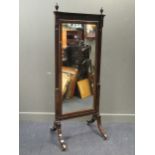 An Edwardian mahogany cheval mirror,