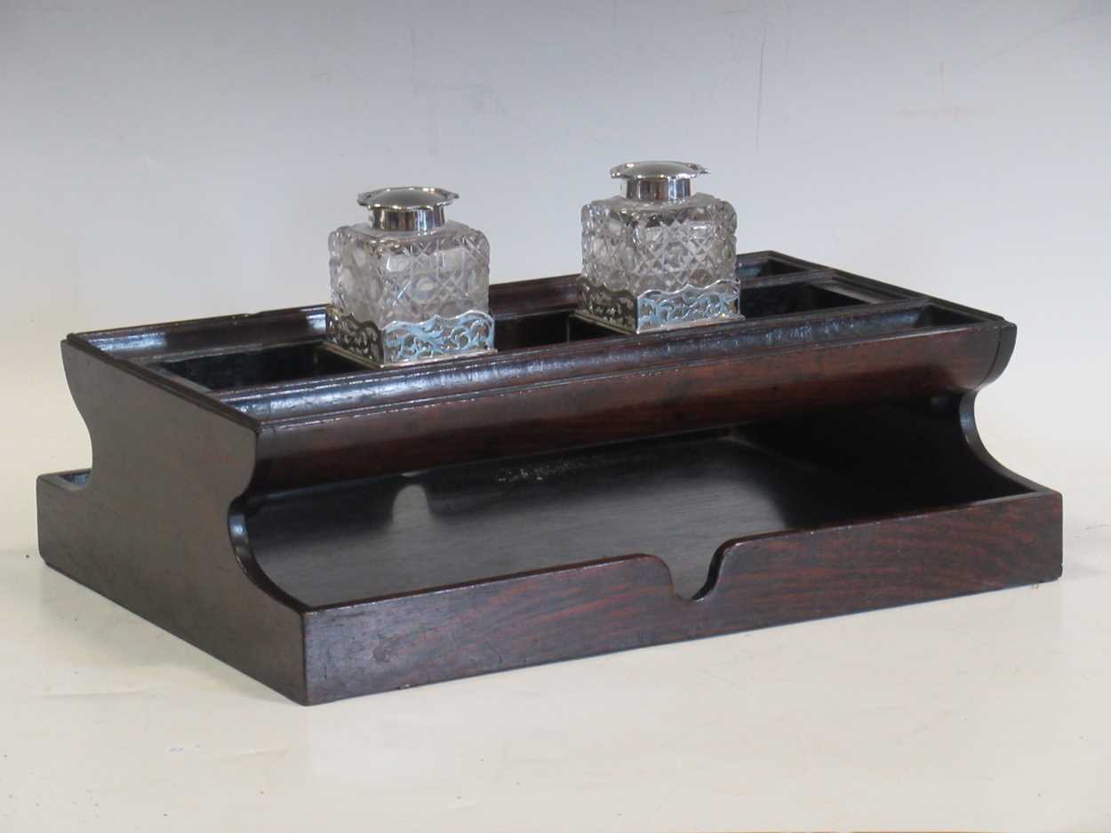 A 19th century desk set, with two silver lidded inkwells