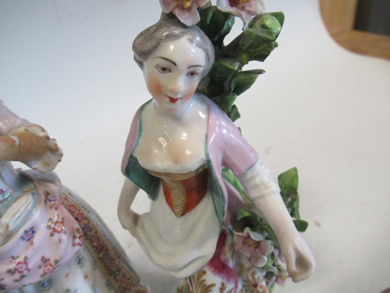 A pair of continental porcelain figurines, two Chelsea style figurines, a pair of Sampson - Image 2 of 8