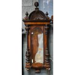 A 19th century walnut case Vienna wall clock, with loose disconnected Dr Aron's System electrical