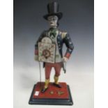 A Continental 'peddler' clock, 40cm high approx