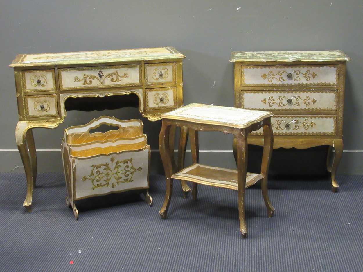 A continental painted serpentine shaped dressing table, a small chest, a table and a magazine