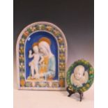 A plaque of the Madonna and child after Della Robbia Workshops, c1900-20