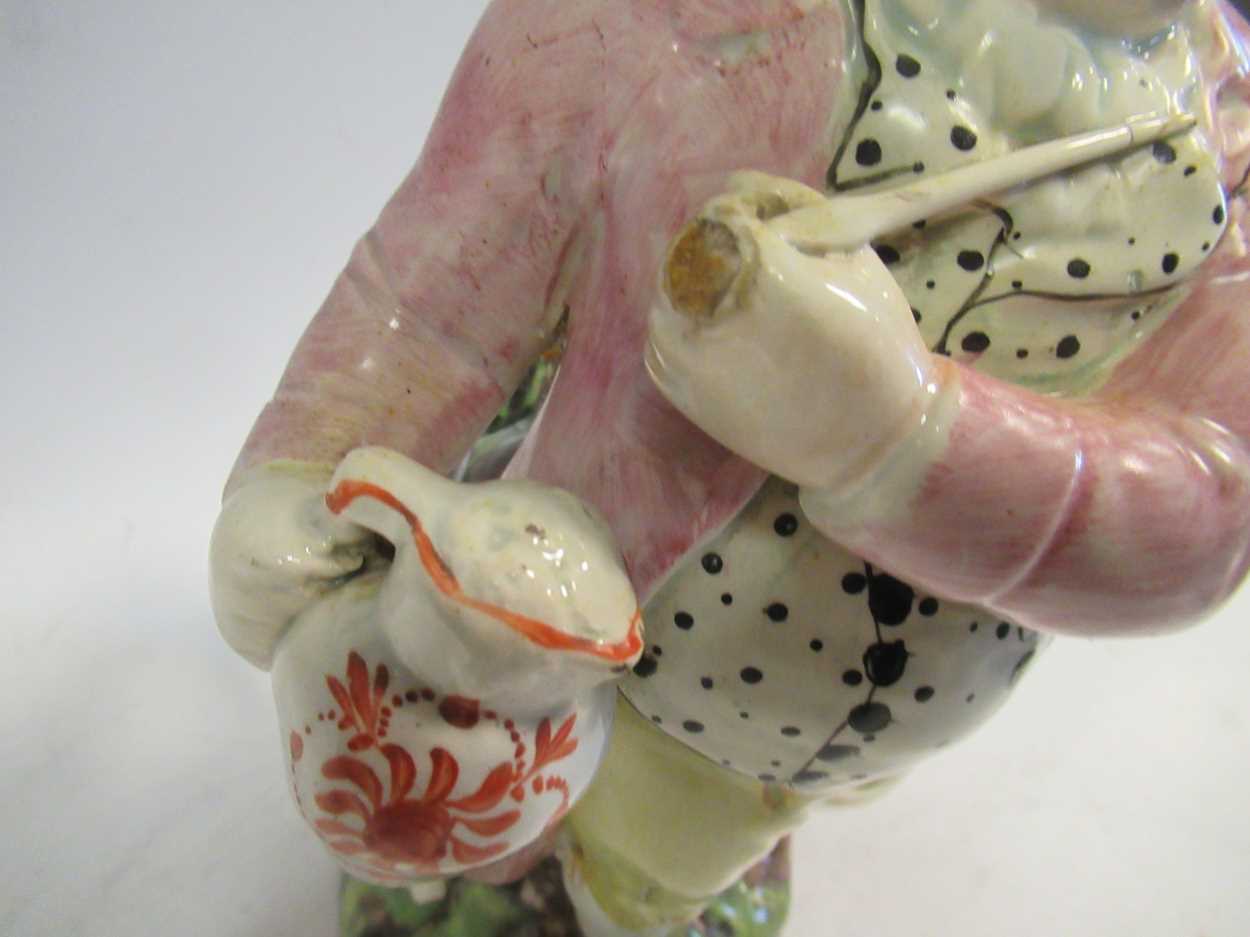 A 19th century Staffordshire Hearty Good Fellow Toby jug, 26.5cm high; a late 19th century bisque - Image 7 of 8