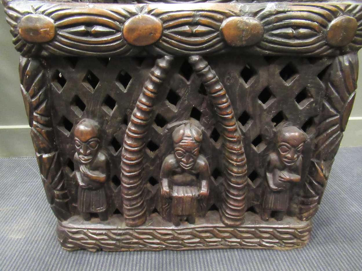 A Bamileke throne chair, profusely carved with animals, patterns and figures 140 x 70 x 55cm - Image 3 of 7