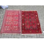 An Afghan rug, 132 x 83cm and a finely woven Baluchi rug, 128 x 87cm