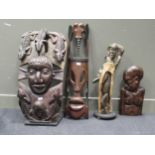 A Makonde tree of life carving on stand 70cm high together with a Bamileke carving of a face
