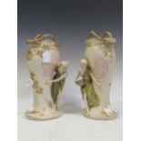 A pair of Royal Dux figural vases, applied pink triangle marks, stamped 1391 & 1392, 35cm high (2)