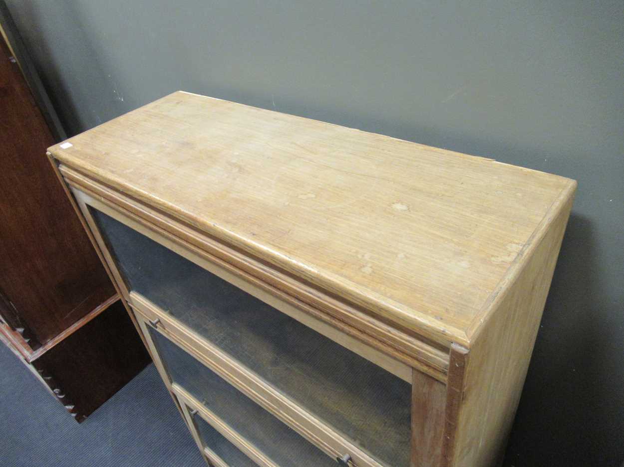 A pair of oak Globe Wernike style bookcases each with three compartments 129 x 88 x 34cm - Image 5 of 8