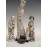 A collection of five ivory statues.