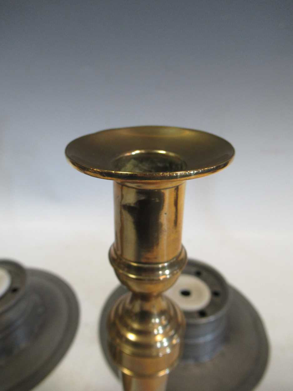 A pair of 18th century peweter inkwells and a pair of George III brass candlesticks - Image 4 of 5