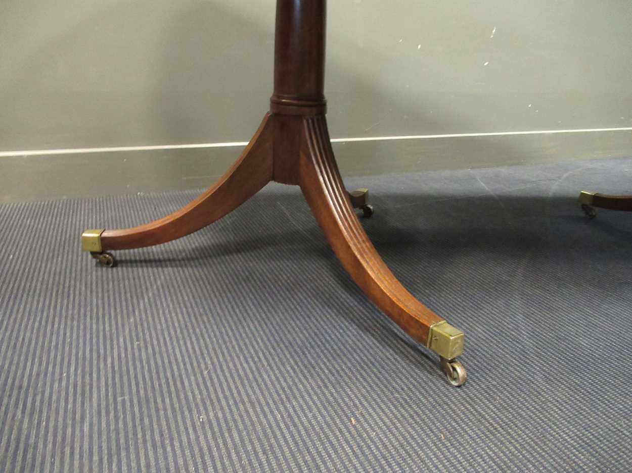 A George III style mahogany twin pedestal dining table with one leaf, early 20th century, the - Image 8 of 8