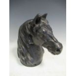 A bronze model of horse's head, 27cm high