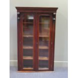 A Victorian glazed two door cabinet with four adjustable shelves 152 x 94 x 36cm