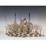 Attributed to MVM Cappellin, a smoke glass suite of glassware, including two decanters and stoppers,