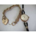 A 9ct gold gate bracelet,16.6 grams together with a 9ct gold lady's 'Vertex' wristwatch (2)