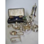 A collection of silver condiments, together with a miniature cream jug, two cased spoon and pusher