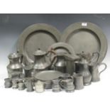 A collection of 18th century and 19th century pewter to include plates, jugs and mugs (qty)