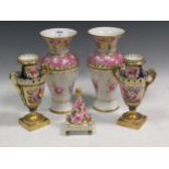A garniture of Worcester vases with script marks, two pairs of 19th century Staffordshire