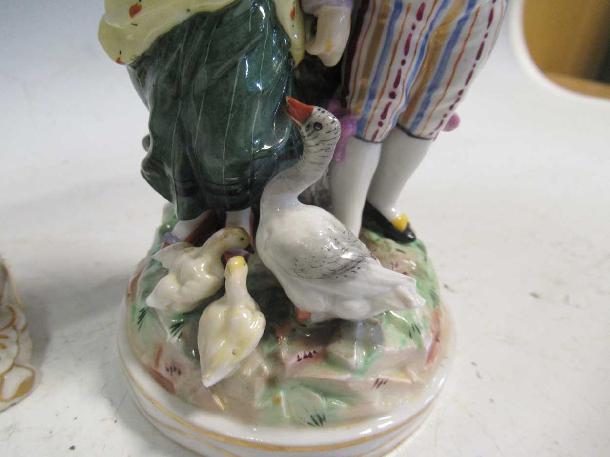 A pair of continental porcelain figurines in Meissen style and a continental porcelain vase and - Image 10 of 11