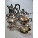 A silver plated 4-piece tea set together with a collection of silver plated flatware