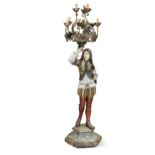 A large painted and carved wood figural candelabra, 20th century,