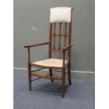 An Edwardian Arts & Crafts inlaid high back armchair, of slender formCondition report: