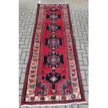 A red ground Hamadan runner 300 x 102cm, modern