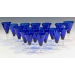 A set of eight red and ten white wine blue glasses, retailed by Thomas Goode