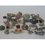 A quantity of silver and costume jewellery, including a moonstone fringe necklet and a collection of