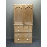 A Victorian pine linen press with castellated top, 211 high x 103 wide x 55 cm deep