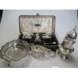 A silver napkin ring, sugar caster, mustard, pierced dish, cased three piece condiment set and