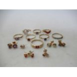 Eight 9ct gold dress rings together with six pairs of 9ct gold earstuds, 22.5g gross (14)