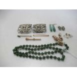 A necklace of nephrite jade beads with a yellow metal push-in clasp, stamped '585 14K', a silver