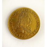A Spanish 8 Escudos coin, 1730