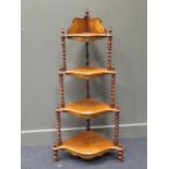 A Victorian four-tier corner etagere, 128 cm high