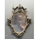 A 19th century gilt wood oval wall mirror 122 x 93cmProvenance:Landwade Hall, Exning, Suffolk