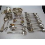 A collection of silver flatware, together with a silver mustard (a/f), silver napkin ring, sauce